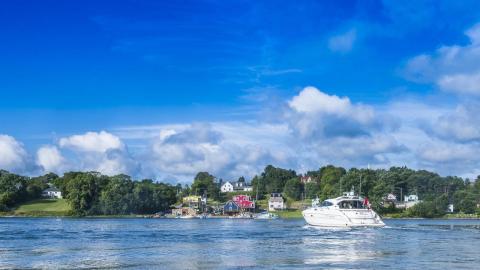 Image of a boat in front of Guysborough Harbour