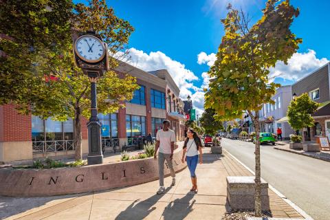 Couple walking in downtown truro