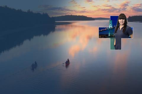 people canoeing at sunset