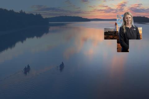 people canoeing at sunset