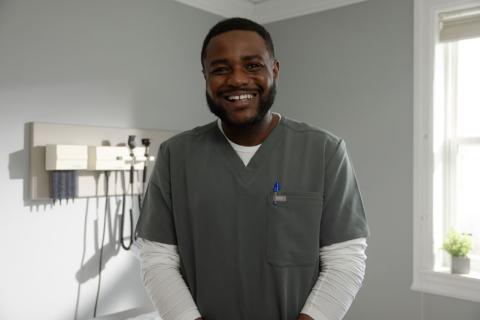 Doctor smiling in room